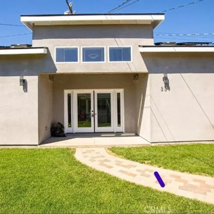 Rent this 4 bed house on 337 East Everett Place in Orange, CA 92867