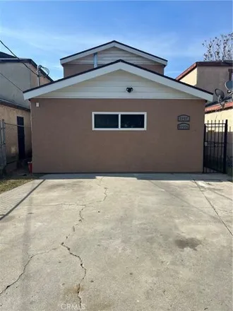 Rent this 3 bed house on 9725 Bandera Street in Los Angeles, CA 90002