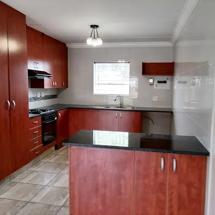 Rent this 2 bed townhouse on Gustav Preller Street in Vorna Valley, Midrand