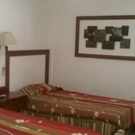 Buy this 15 bed apartment on Farmacias Especializados in Ciclovía Av. Tulum, Smz 5