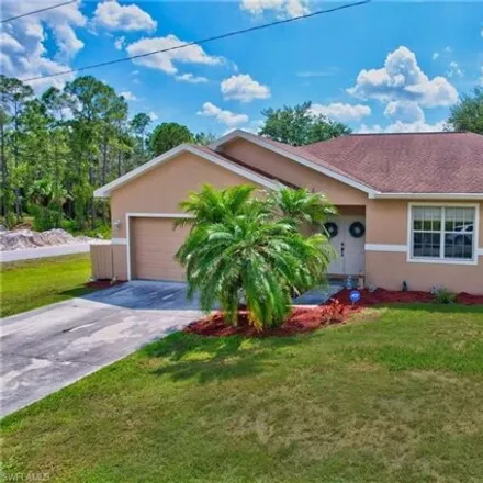 Buy this 4 bed house on 1909 Milstead Ave in Lehigh Acres, Florida