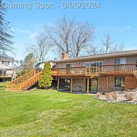 Image 6 - 4591 Ravinewood Drive, Commerce Charter Township, MI 48382, USA - House for sale