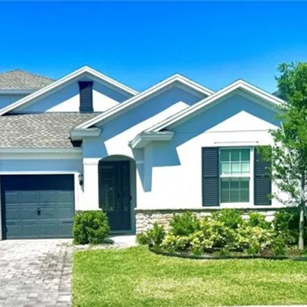 Rent this 4 bed house on 4469 Davos Drive in Clermont, FL 34711