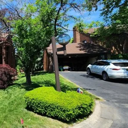 Rent this 4 bed condo on 98 Kimberley Lane in Dearborn, MI 48120