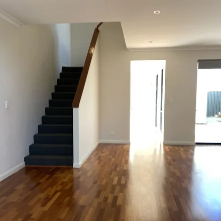 Rent this 3 bed townhouse on Ringwood Loop in Wellard WA 6170, Australia