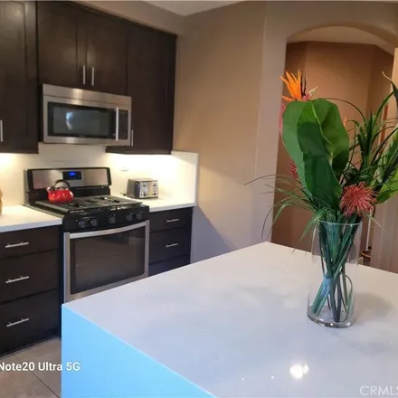 Rent this 4 bed apartment on 20663 Azalea Terrace Road in Riverside, CA 92518