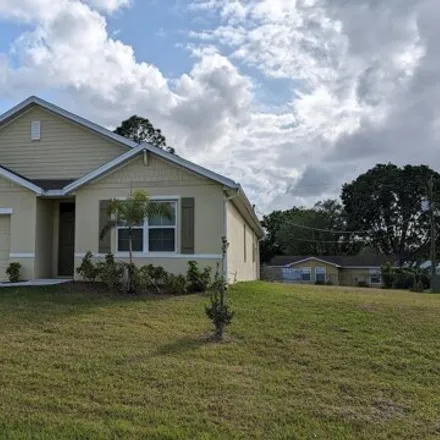 Rent this 4 bed house on 2112 Jupiter Boulevard Southwest in Palm Bay, FL 32908