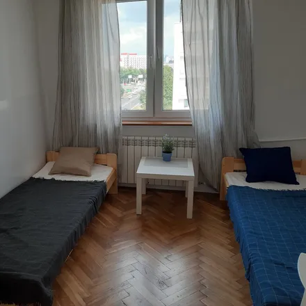 Rent this 4 bed room on Aleja Niepodległości 24/30 in 02-653 Warsaw, Poland