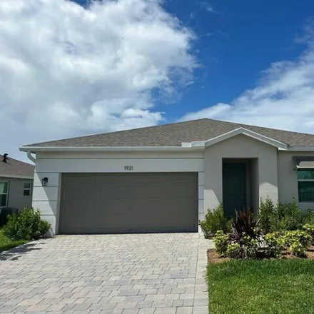 Rent this 3 bed house on 1901 Northeast 23rd Terrace in Jensen Beach, FL 34957