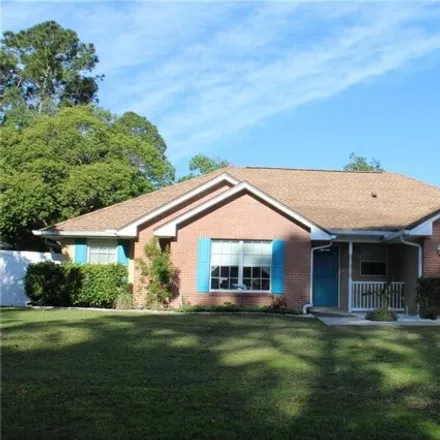 Buy this 3 bed house on 15 Woodbury Drive in Palm Coast, FL 32164