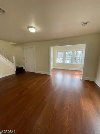 Rent this 4 bed house on Pine Grove Terrace in Newark, NJ 07106