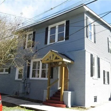 Rent this 4 bed house on 2133 Burdette Street in New Orleans, LA 70118