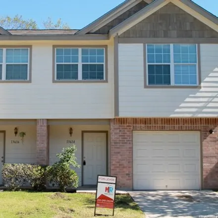 Rent this 3 bed townhouse on 13614 Woodstone Way in San Antonio, TX 78233