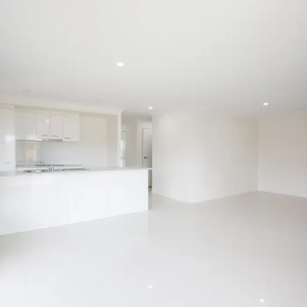 Rent this 3 bed apartment on Azure Street in Rosewood QLD, Australia
