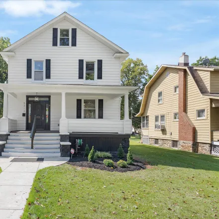 Buy this 6 bed house on 5301 Fernpark Avenue in Baltimore, MD 21207
