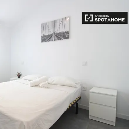 Rent this 6 bed room on Caramuel in Calle de Caramuel, 28011 Madrid
