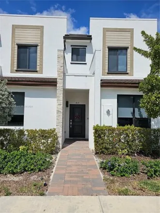 Rent this 3 bed townhouse on 820 Northeast 212th Terrace in Miami-Dade County, FL 33179