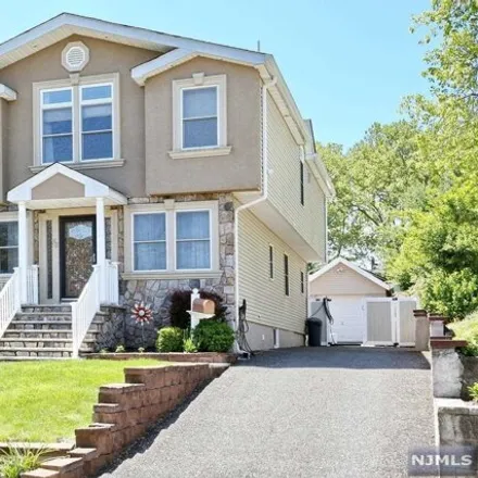 Buy this 4 bed house on 58 Central Ave in Hasbrouck Heights, New Jersey