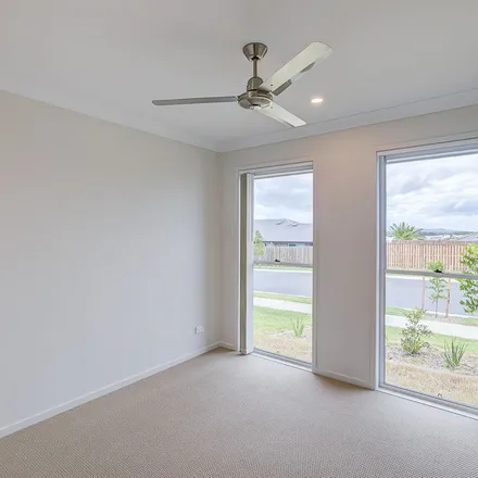 Rent this 4 bed apartment on Heath Terrace in Park Ridge QLD 4125, Australia