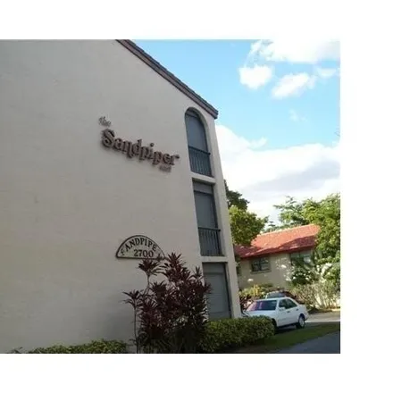 Rent this 2 bed apartment on 2732 Coral Springs Drive in Coral Springs, FL 33065