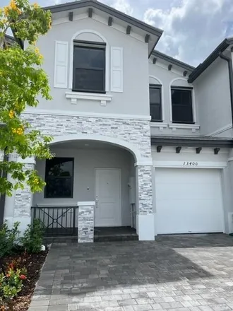 Rent this 3 bed townhouse on 28620 Southwest 143rd Court in Homestead, FL 33033