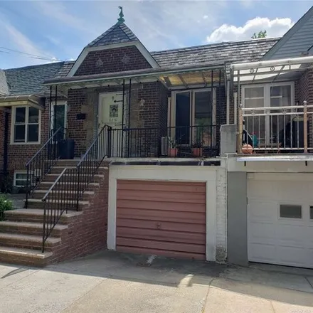 Buy this 2 bed house on 62-10 84th St in Middle Village, New York