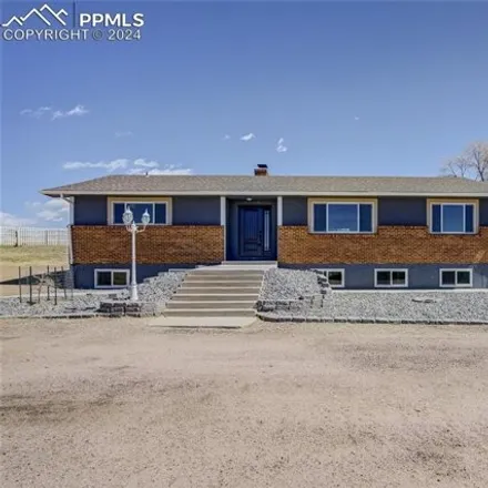 Buy this 5 bed house on 11449 Dodge Circle in El Paso County, CO 80831