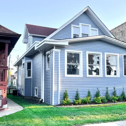 Buy this 4 bed house on 5427 West Thomas Street in Chicago, IL 60651