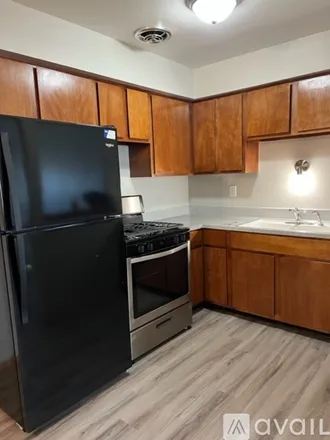 Rent this 2 bed apartment on 4619 S Howell Ave