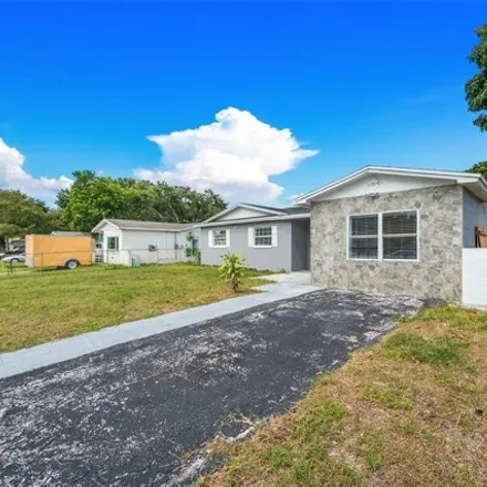 Rent this 5 bed house on 11823 129th Avenue North in Ridgecrest, Pinellas County