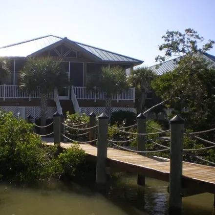 Buy this 2 bed house on Everglades Fishing Lodge in 313 North Storter Avenue, Everglades City