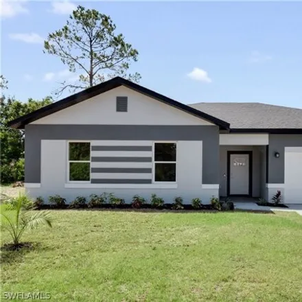 Buy this 4 bed house on 1040 Milwaukee Blvd in Lehigh Acres, Florida