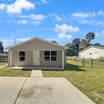 Buy this 4 bed house on 506 E Caroline St in Tavares, Florida