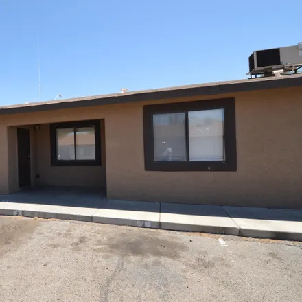 Rent this 3 bed townhouse on 224 West Roger Road in Tucson, AZ 85705