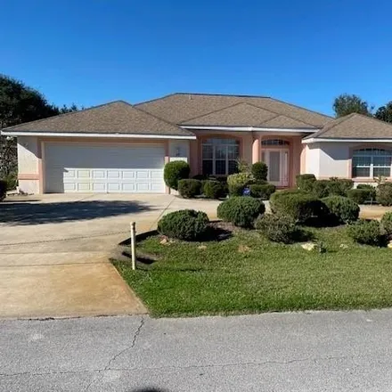 Rent this 3 bed house on 30 Firethorn Lane in Palm Coast, FL 32137