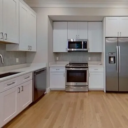 Rent this 2 bed apartment on 104-106 Warren St Unit 6 in Boston, Massachusetts