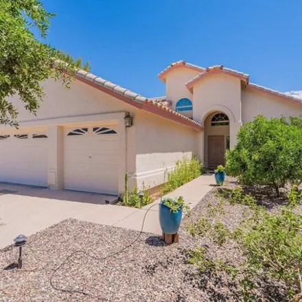 Buy this 4 bed house on 8898 North Dusk Glow Court in Pima County, AZ 85704