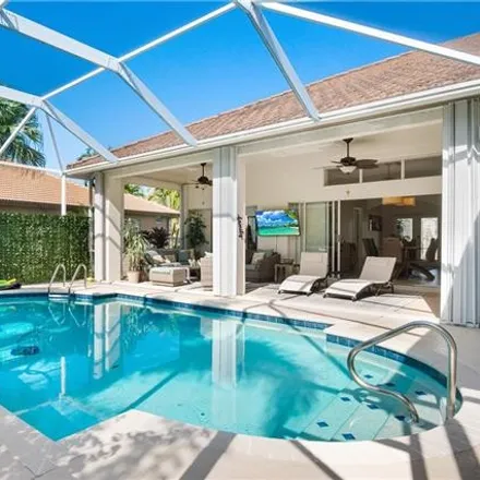 Rent this 4 bed house on 28494 Del Lago Way in Preserve at Woods Edge, Bonita Springs