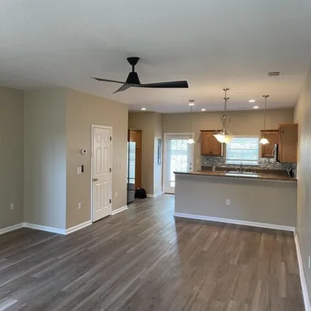 Rent this 4 bed condo on Del Carmel Way in Tallahassee, FL 32302