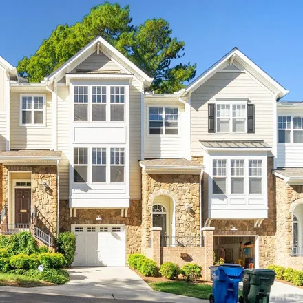 Buy this 4 bed townhouse on 5139 Lady of The Lake Drive in Raleigh, NC 27612