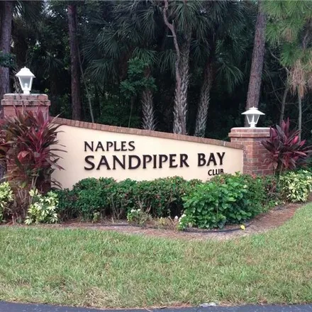Buy this 2 bed condo on 3056 Sandpiper Bay Circle in East Naples, FL 34112