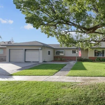 Buy this 4 bed house on 1557 East Stuart Avenue in Fresno, CA 93710