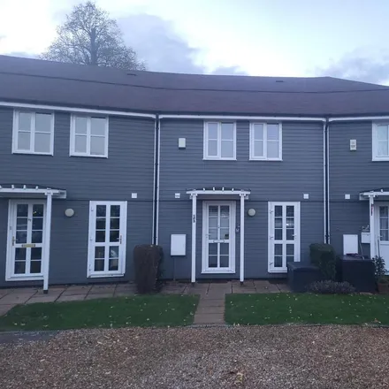 Rent this 3 bed townhouse on Overstone Park Golf Club in Malesoure Walk, Northampton
