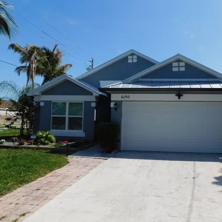 Rent this 2 bed house on 15199 Marrian Avenue in North Palm Beach Heights, Jupiter