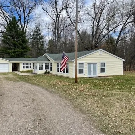 Buy this 3 bed house on 20746 East Moss Road in Norman Township, MI 49689