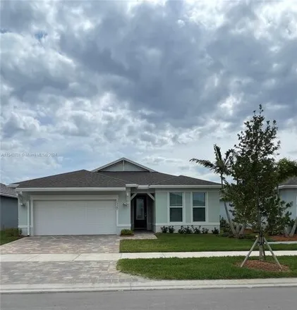 Rent this 3 bed house on Southwest Vermillion Circle in Port Saint Lucie, FL 34853