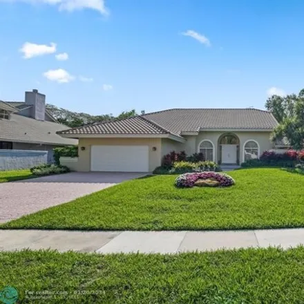 Buy this 4 bed house on 5748 Northwest 22nd Avenue in Boca Raton, FL 33496