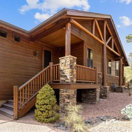 Buy this 2 bed house on 3144 Black Oak Loop in Show Low, AZ 85901