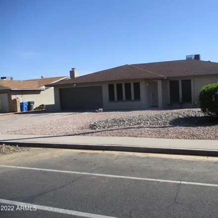Buy this 4 bed house on 5722 West Grovers Avenue in Glendale, AZ 85308