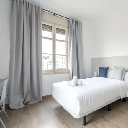 Rent this 2 bed room on Europhil change in Carrer de Nàpols, 08001 Barcelona